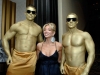 carla-collins-in-a-gold-man-sandwich